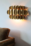 Antique Brass Curve Disc Wall Light